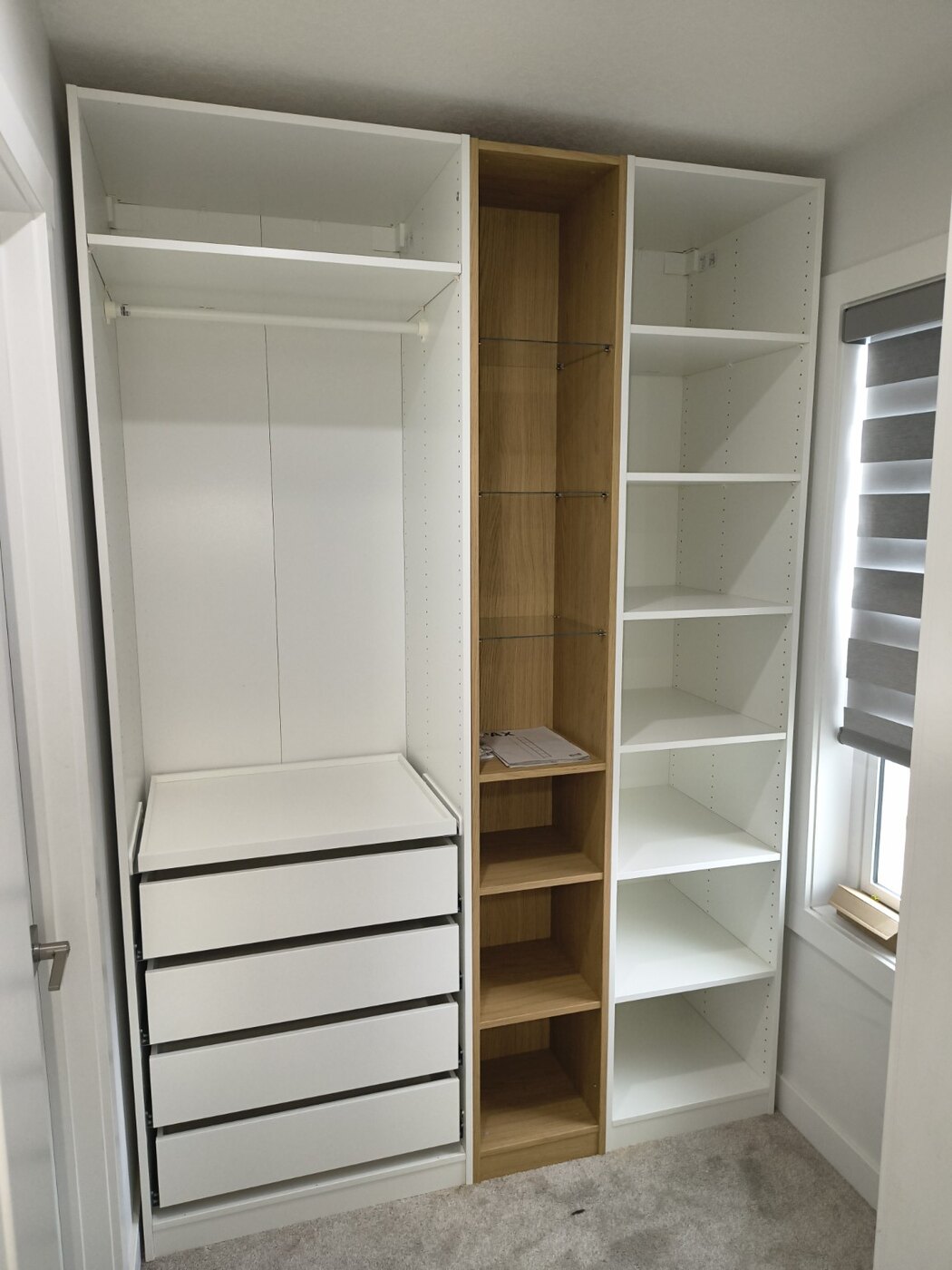 Completed multi-unit IKEA wardrobe and display storage