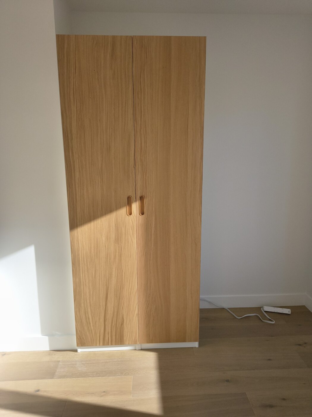 Completed oak-front IKEA PAX wardrobe