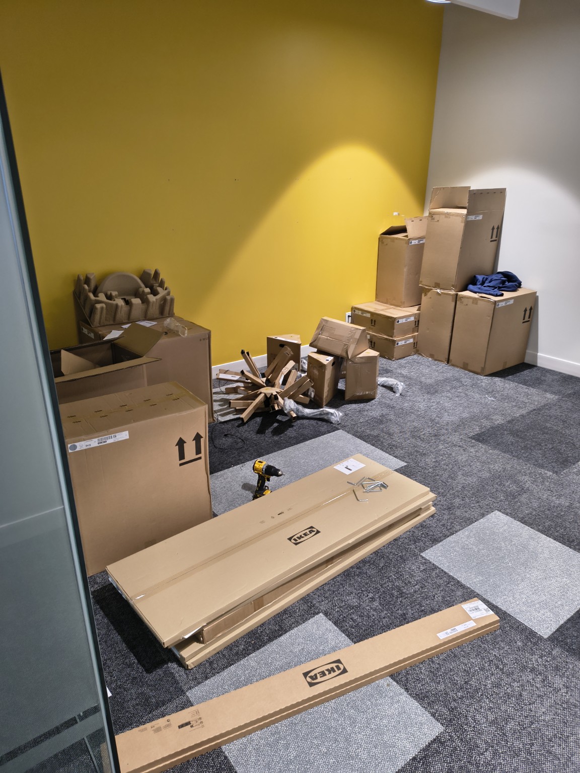 Flat-packed office furniture before assembly
