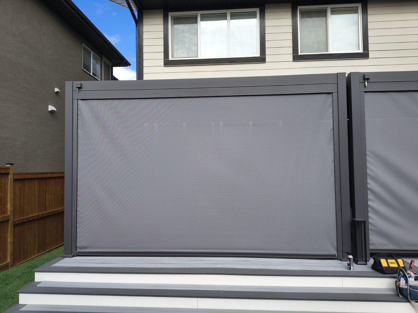 Backyard pergola after the screen installation